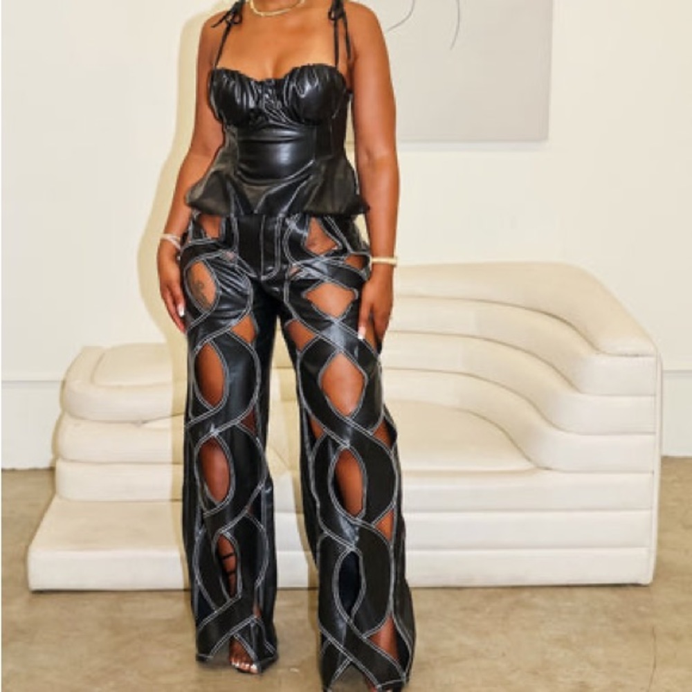 Cutout faux leather pants size L